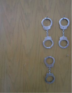 These handcuffs appeared out of place in an alternative school. Questioning their presence revealed a serious concern during a school security assessment