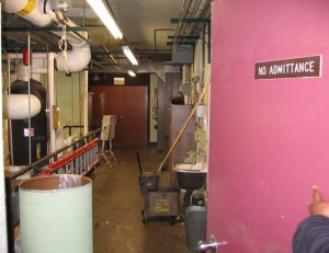 This unlocked boiler room is the type of location where students sometimes engage in sexual activities.  Space management is an important concept for school officials to use to prevent both consensual sexual encounters and sexual assaults.